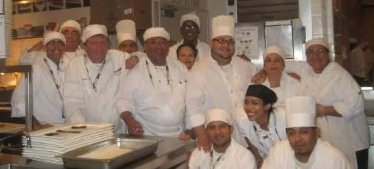 Daniel Ruiz with his kitchen brigade in a New York City kitchen